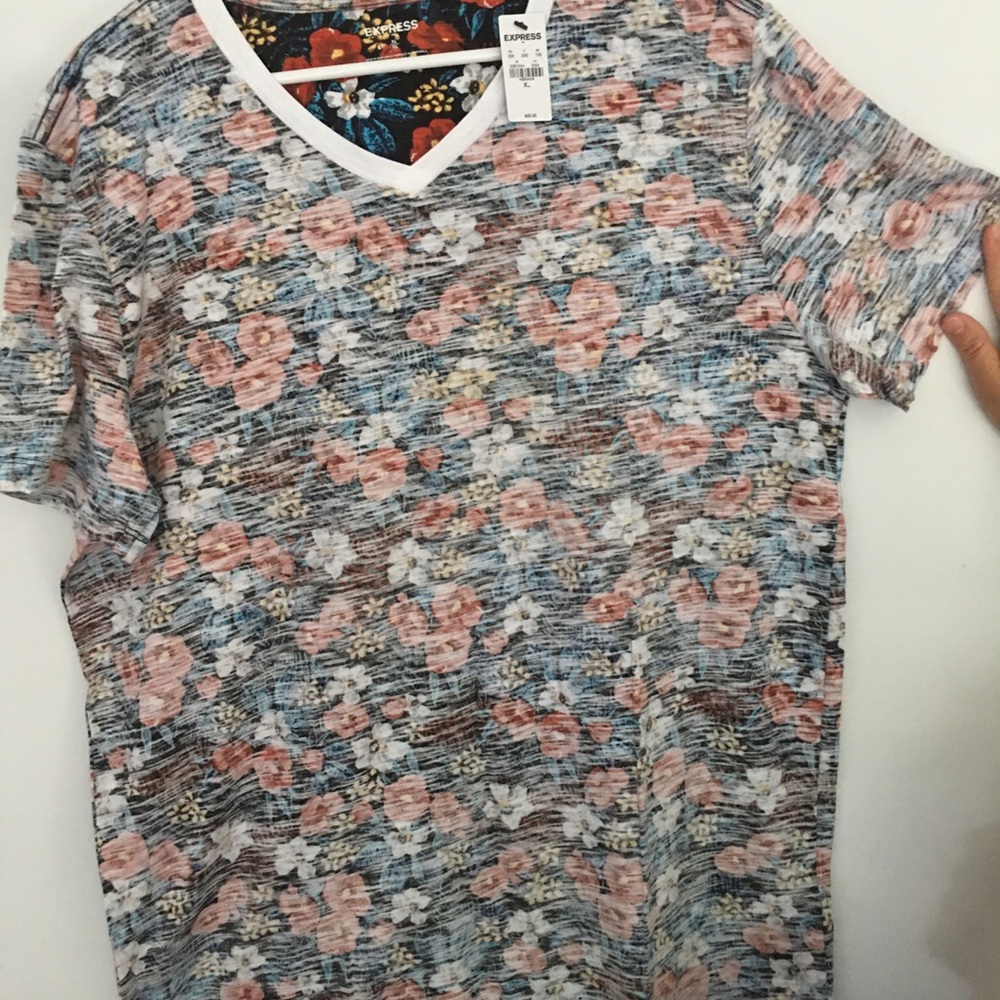 Express shirt with flowers on it